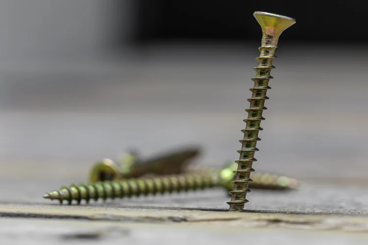 3ea07112-a917-40c7-850f-e27da2f72864-screws-wooden-wall.jpg
